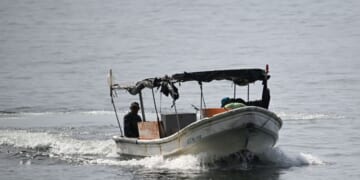 Fishermen sail on a boat near Caraballeda, La Guaira State, Venezuela, on Sept. 24, 2025.