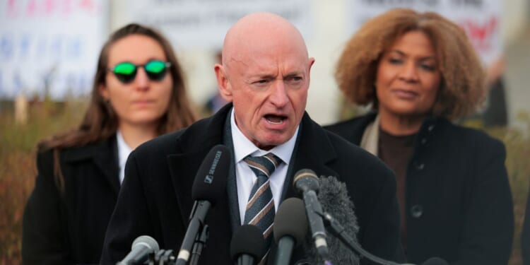 Sen. Mark Kelly speaks during a news conference on the "Epstein Files" outside the U.S. Capitol on Nov. 18, 2025, in Washington, D.C.