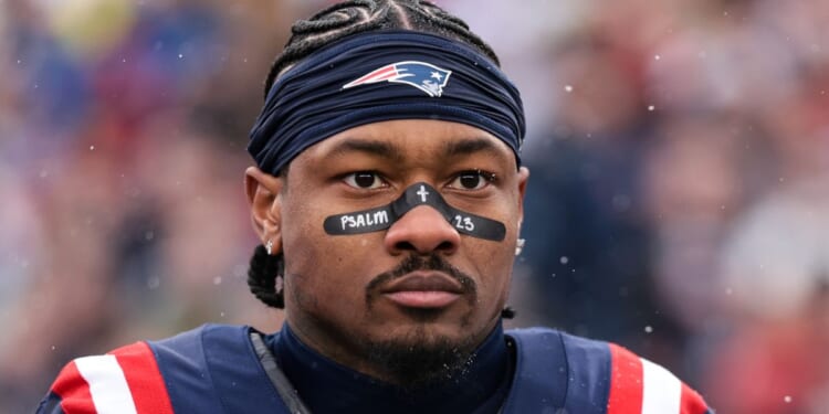 Stefon Diggs #8 of the New England Patriots stands on the sideline during the national anthem Dec. 14 before the game against the Buffalo Bills at Gillette Stadium in Foxborough, Massachusetts.