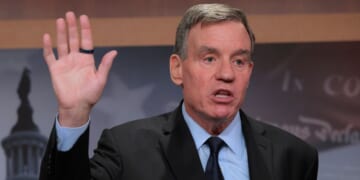 Sen. Mark Warner, a Democrat from Virginia, talks to reporters about Democrats being excluded from briefings the Trump administration gave to Republicans about military strikes on alleged drug boats at the U.S. Capitol on Oct. 30, 2025, in Washington, D.C.