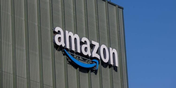 The Amazon logo is displayed on an Amazon Logistic building in Antwerp on Oct. 30, 2025.