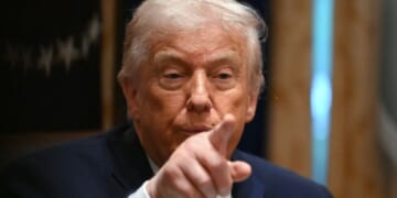 President Donald Trump points during a roundtable event in the Cabinet Room of the White House in Washington, DC on Dec. 8, 2025.
