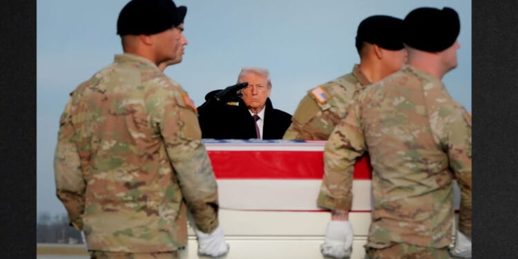 President Donald Trump salutes Wednesday as a U.S. Army carry team moves a flagged-draped transfer case containing the remains of Ayad Mansoor Sakat, a U.S. civilian working as an interpreter, at Dover Air Force Base in Dover, Delaware. Iowa National Guard members Sgt. William Nathaniel Howard and Sgt. Edgar Brian Torres-Tovar were also killed during a recent ambush by an Islamic State gunman in Syria. (Anna Moneymaker / Getty Images)