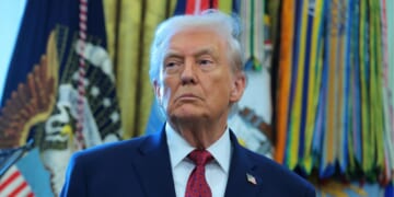 President Donald Trump listens during a ceremony for the presentation of the Mexican Border Defense Medal in the Oval Office of the White House on Dec. 15, 2025, in Washington, D.C.