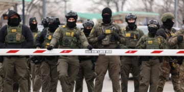 U.S. Border Patrol agents stand guard at the Bishop Henry Whipple Federal Building in Minneapolis, Minnesota, on Jan. 8, 2026.