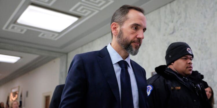 Former Special Counsel Jack Smith returns from a break to testify during a closed-door deposition before the House Judiciary Committee in the Rayburn House Office Building on Capitol Hill on Dec. 17, 2025, in Washington, D.C.