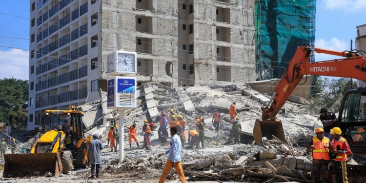 A tall building under construction falls in Nairobi, with 4 believed to be trapped