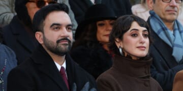 New York City Mayor Zohran Mamdani and his wife Rama Duwaji listen to the national anthem during his public inauguration ceremony followed by a block party at City Hall in New York on Jan. 1, 2026.