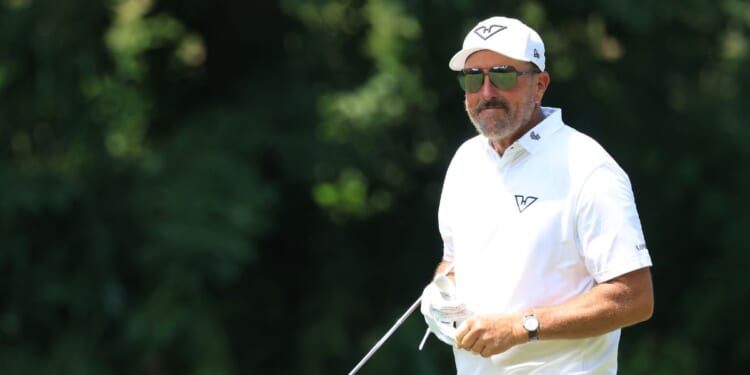 Phil Mickelson of Hyflyers GC walks the 16th fairway on day two of LIV Golf Indianapolis at The Club at Chatham Hills on Aug. 16, 2025, in Westfield, Indiana.
