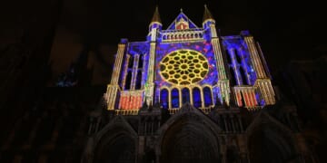 This photograph shows the illuminated Notre-Dame Cathedral in Charles on Christmas Eve, Dec. 24, 2025 in north-central France.