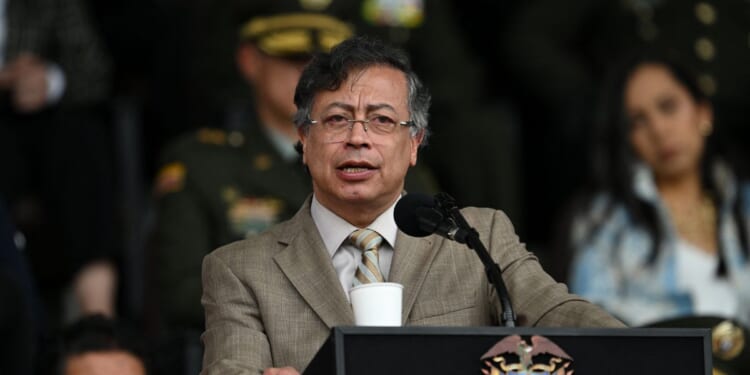 Colombian President Gustavo Petro delivers a speech during the commemoration of the 134th anniversary of the National Police and the promotion of officers at the General Santander Police Academy in Bogota, Colombia, on Nov. 13, 2025.