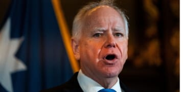 Minnesota Gov. Tim Walz speaks Monday during a press conference at the State Capitol building in St. Paul, Minnesota. Walz announced that he is abandoning his re-election campaign for governor, blaming scrutiny from President Donald Trump for his decision.