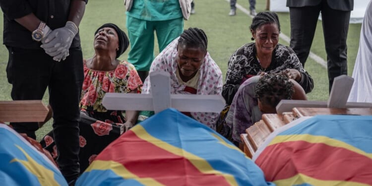 M23 rebel group holds a symbolic funeral for victims of drone strike in eastern Congo