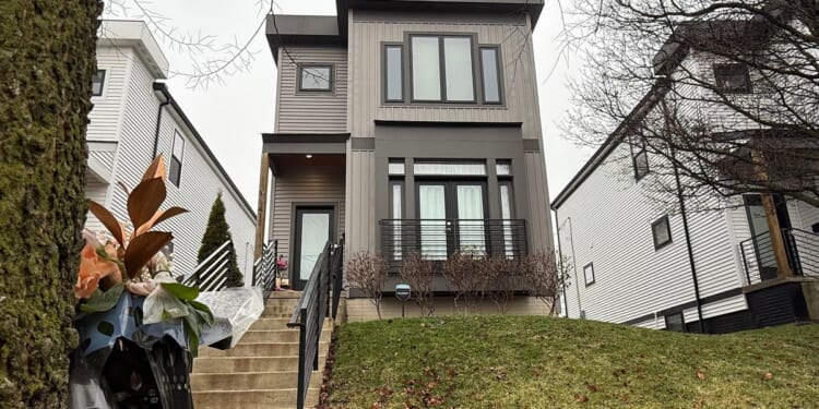 Doctor charged with murdering his ex-wife and her Ohio husband waives right to extradition hearing