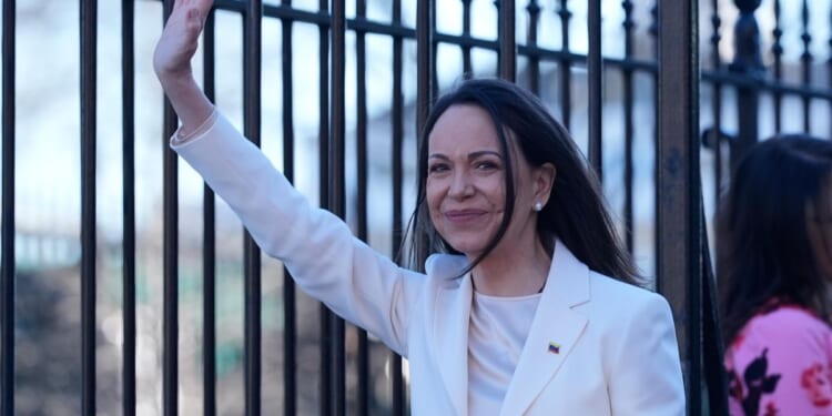 Maria Corina Machado gives Donald Trump her Nobel prize in White House meeting on Venezuela's future