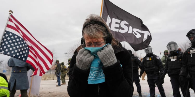 Trump threatens to invoke Insurrection Act while Minneapolis roils under raids