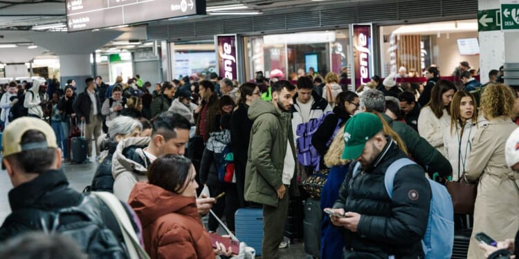 Trains collide after one derails in southern Spain, killing at least 10 people