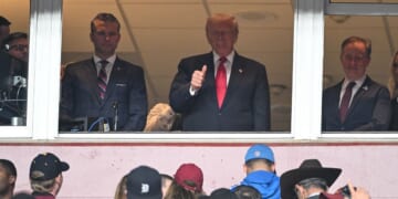 Trump cheered at college football title game