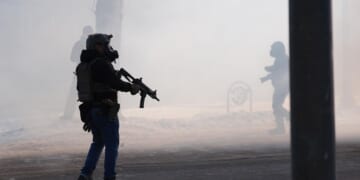 Police chief calls for calm after a man is shot and killed during Minneapolis immigration crackdown