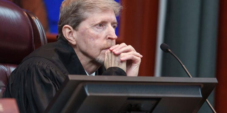 Utah governor signs bill adding justices to state Supreme Court as redistricting appeal looms