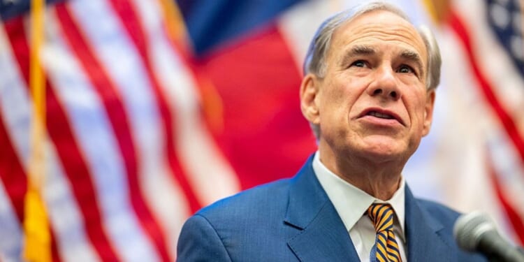 Texas Gov. Greg Abbott, seen in an August photo, condemned illegal aliens who have been trying to ram ICE agents with their vehicles. "These criminals must be arrested," he said.