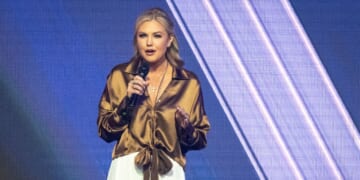 Turning Point USA CEO Erika Kirk speaks at the annual AmericaFest conference in remembrance of late right-wing political activist Charlie Kirk, in Phoenix, Arizona, on Dec. 21, 2025.