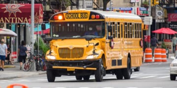 A school bus transports students through the New York and New Jersey areas on Aug. 17, 2020.