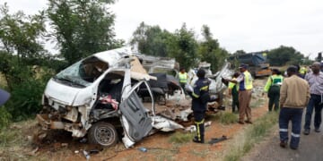 Police inspect the scene of a collision between a truck and a minibus carrying school children in Vanderbijlpark, South of Johannesburg, South Africa, on Jan. 19, 2026.