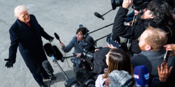 President Donald Trump speaks to the media on the South Lawn of the White House on Friday.