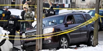 Members of law enforcement secure the scene of the shooting of Renee Good by an ICE agent after a tense exchange ending with her refusing to comply with lawful orders and pressing on the gas while he stood in front of the vehicle in Minneapolis, Minnesota, on Jan. 7, 2026.