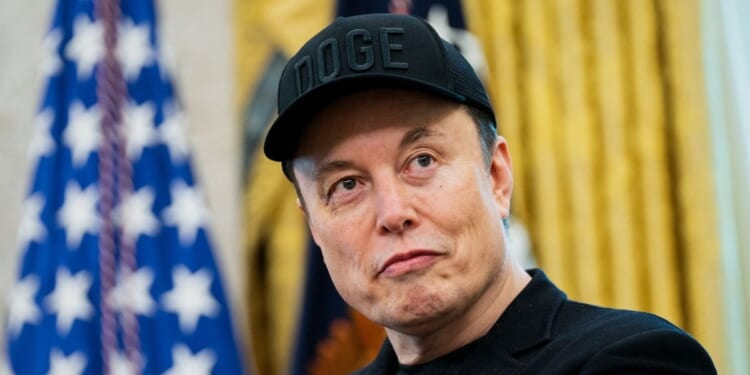 Elon Musk looks on during a news conference with President Donald Trump in the Oval Office of the White House in Washington, D.C., on May 30, 2025.