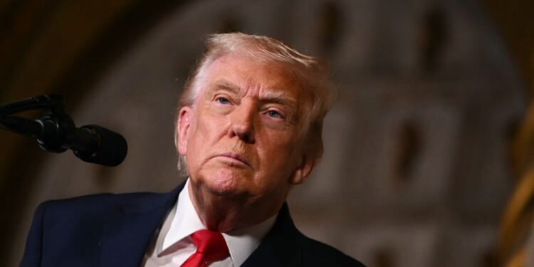 US President Donald Trump takes questions from journalists at Mar-a-Lago in Palm Beach, Florida, on December 22, 2025.