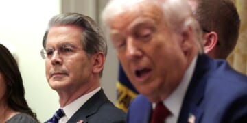 President Donald Trump speaks at a roundtable discussion with farmers in the Cabinet Room of the White House next to U.S. Treasury Secretary Scott Bessent.