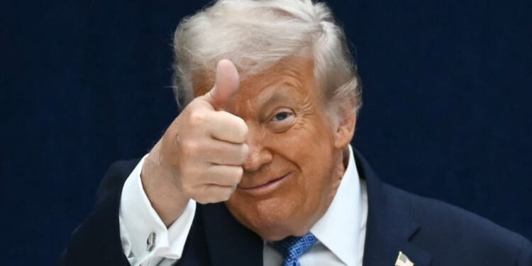 President Donald Trump, seen in a December photo, is being credited with more economic wins for the country.