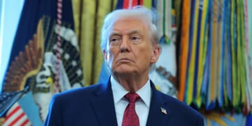 President Donald Trump listens during a ceremony for the presentation of the Mexican Border Defense Medal in the Oval Office of the White House on Dec. 15, 2025, in Washington, D.C.
