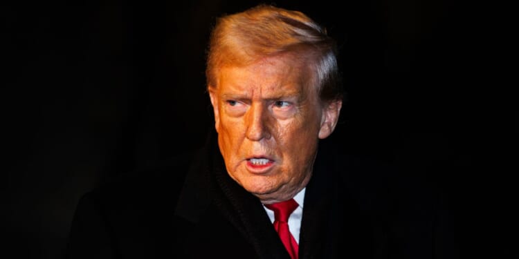 President Donald Trump walks over to reporters on the South Lawn of the White House in Marine One on Jan. 20, 2026 in Washington, DC.