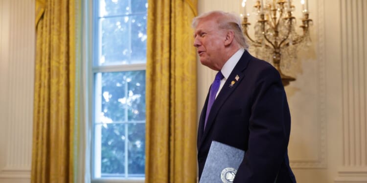 President Donald Trump arrives to a meeting with oil and gas executives in the East Room of the White House on Jan. 9, 2026, in Washington, D.C.