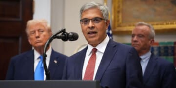 Director of the National Institutes of Health Jay Bhattacharya, joined by President Donald Trump and Health and Human Services Secretary Robert F. Kennedy Jr., delivers remarks during an announcement by President Donald Trump on “significant medical and scientific findings for America’s children” in the Roosevelt Room of the White House on Sept. 22, 2025, in Washington, D.C.