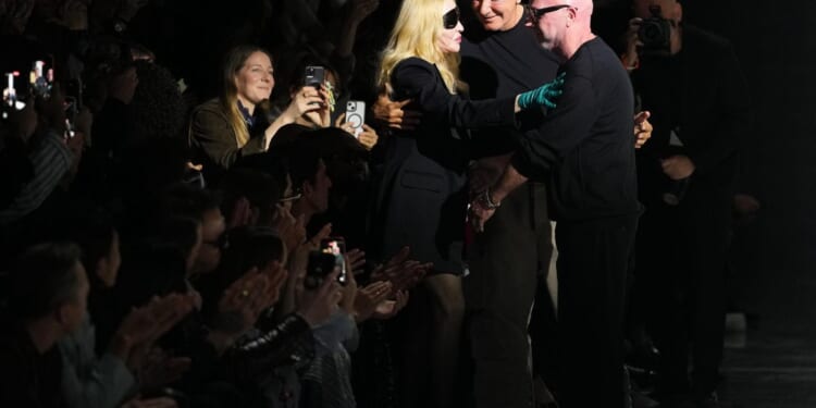 Madonna steals the spotlight at Dolce & Gabbana's Milan Fashion Week runway show