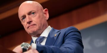 U.S. Sen. Mark Kelly of Arizona speaks at a Feb. 11 news conference.