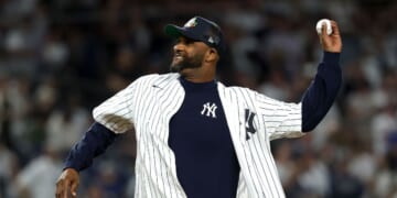 Former New York Yankee CC Sabathia throws the ceremonial first pitch before the game between the New York Yankees and the Toronto Blue Jays in game three of the American League Division Series at Yankee Stadium on Oct. 7, 2025, in the Bronx borough of New York City.