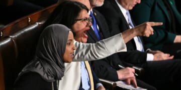 Democratic Rep. Rashida Tlaib of Michigan shouts while pointing a finger at President Donald Trump during Trump's State of the Union address in the Capitol on Tuesday.