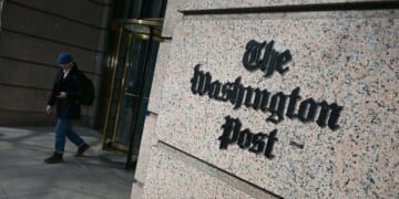 A man exits the Washington Post office building in Washington, D.C., in a file photo dated Feb. 4.