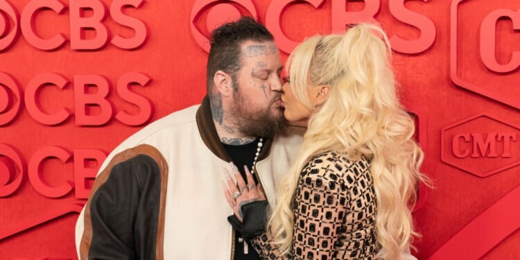 Jelly Roll and his wife, singer Bunnie Xo, attend the 2024 Country Music Television Awards at the Moody Center in Austin, Texas, on April 7, 2024.