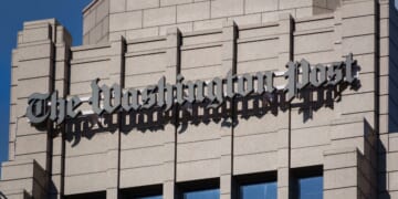 The logo of The Washington Post is displayed on the top of the organization's editorial headquarters in Washington, DC on May 26, 2025.