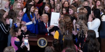 President Donald Trump was joined by women athletes as he signed the “No Men in Women’s Sports” executive order in the East Room at the White House on Feb. 5, 2025.