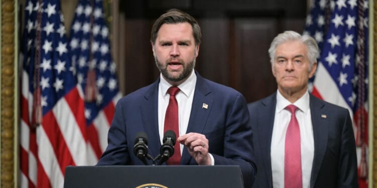 Vice President J.D. Vance, alongside Medicare and Medicaid Administrator Mehmet Oz, speaks about combatting fraud, at the Eisenhower Executive Office Building on the White House complex in Washington, D.C., on Feb. 25, 2026.