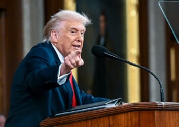 President Donald Trump points an accusing finger at the Democratic side of his audience during Tuesday's State of the Union address in the Capitol.