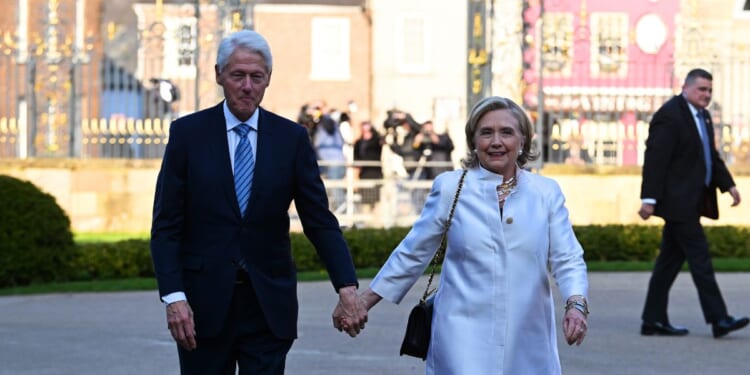Former Secretary of State Hillary Clinton and former President Bill Clinton arrive at Hillsborough Castle for the Gala dinner to mark the 25th anniversary of the Belfast/Good Friday Agreement on April 19, 2023, in Belfast, Northern Ireland.