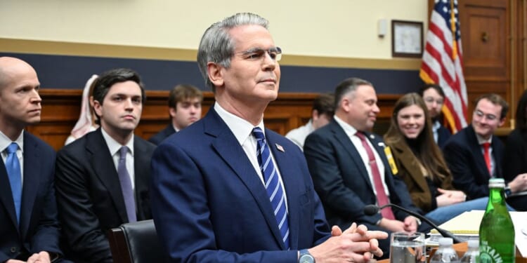 US Treasury Secretary Scott Bessent takes a seat after arriving to testify at a House Financial Services Committee hearing on Capitol Hill in Washington, DC on Feb. 4, 2026.